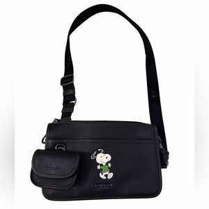 Coach X Peanuts Heritage Convertible Crossbody bag featuring a Snoopy motif.